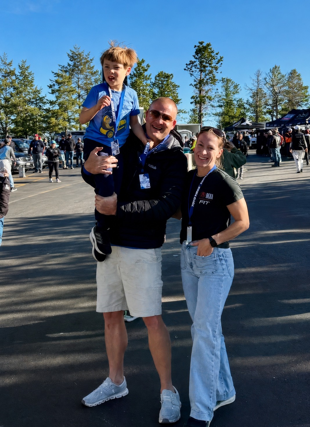 A family celebrating together at a community race
